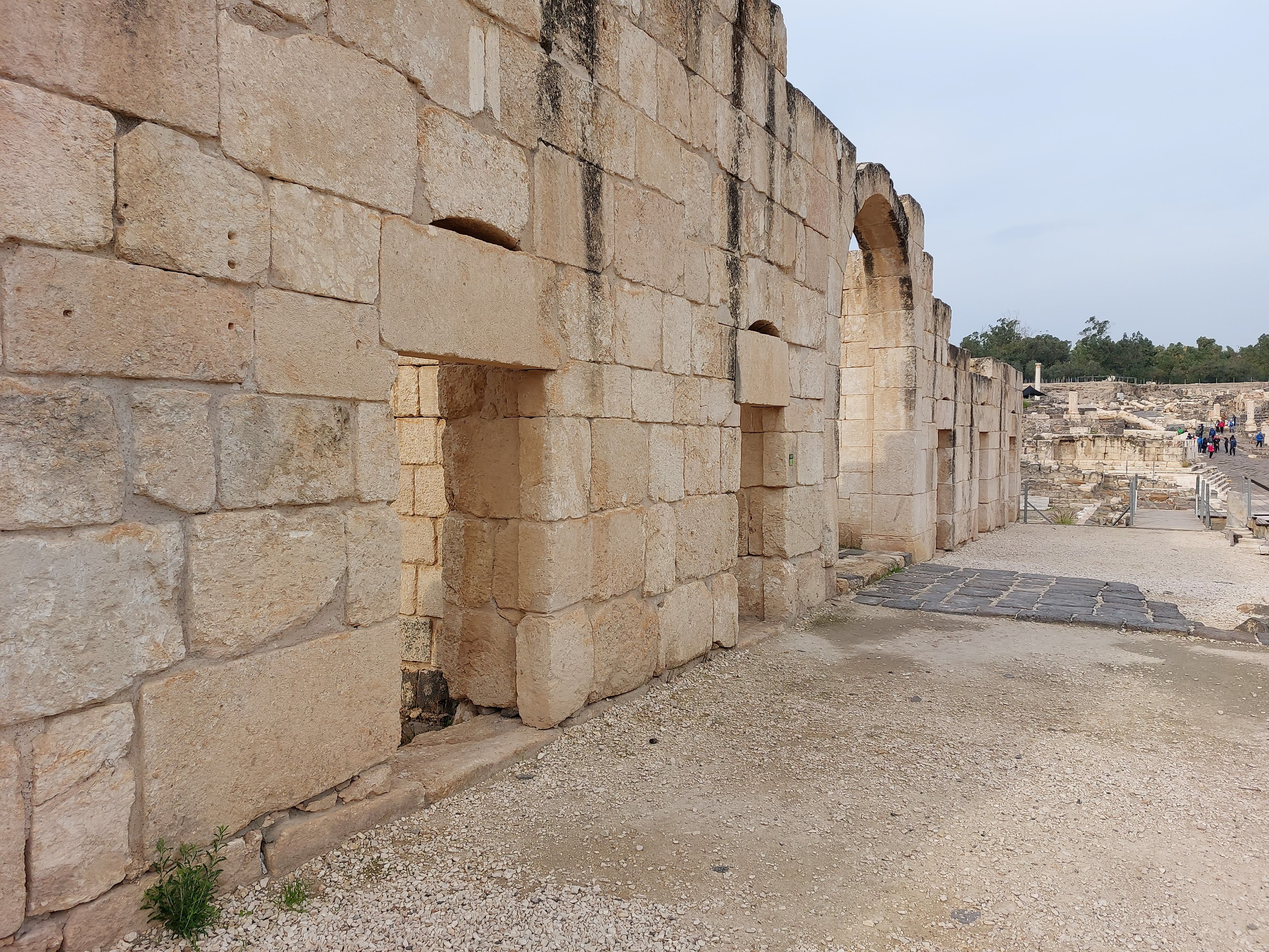 Ancient Roman market buildings at Beth-Shan with arched stone niches where merchants would display their goods