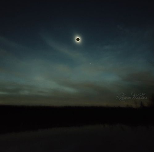 Solar eclipse over a dark landscape — Centuries of Darkness