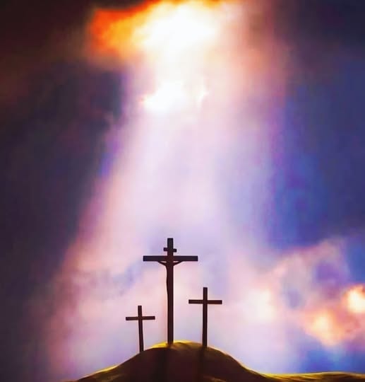 Three crosses on a hill with dramatic rays of light breaking through stormy clouds